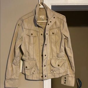 A tan jacket shirt by maurices...